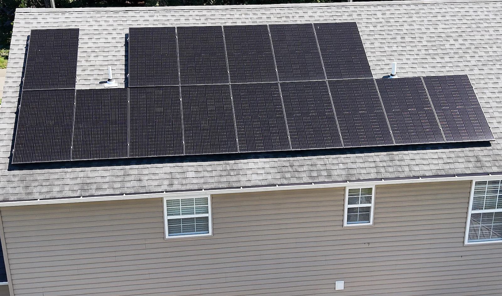 Aerial documentation of a rooftop solar panel array on a residential home